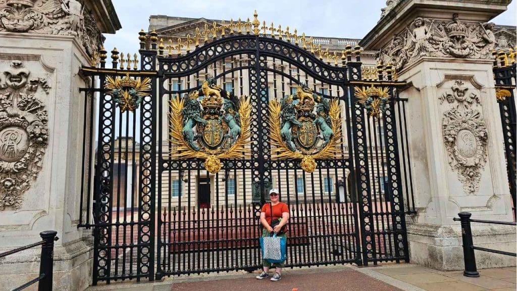 Rona the Ribbiter standing at Buckingham Palace